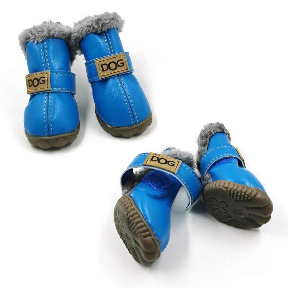 Lot of four blue Pup Ugg™ - Dog Winter Shoes on a white background.