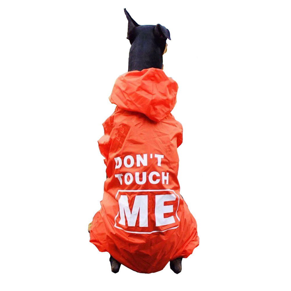 Black dog in an orange Menace™ - Matching Dog & Owner Raincoat, Medium and Large Dogs with hood and legs on a white background.