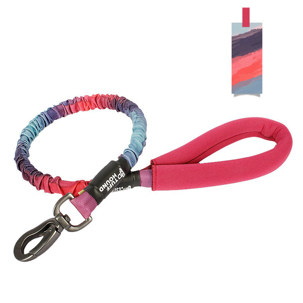 Red TuffHound Recoil™ - Bungee Dog Leash on a white background.