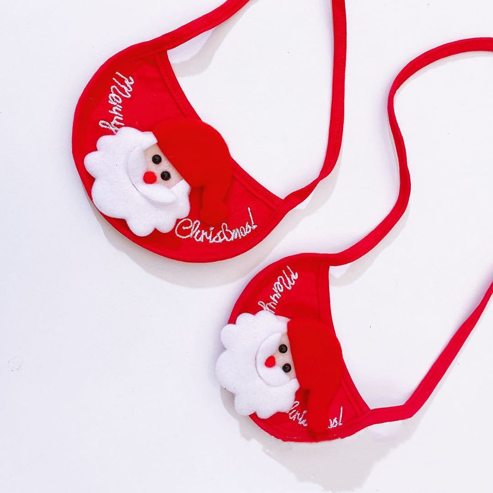 A pair of red Christmas Bibs on a white background.