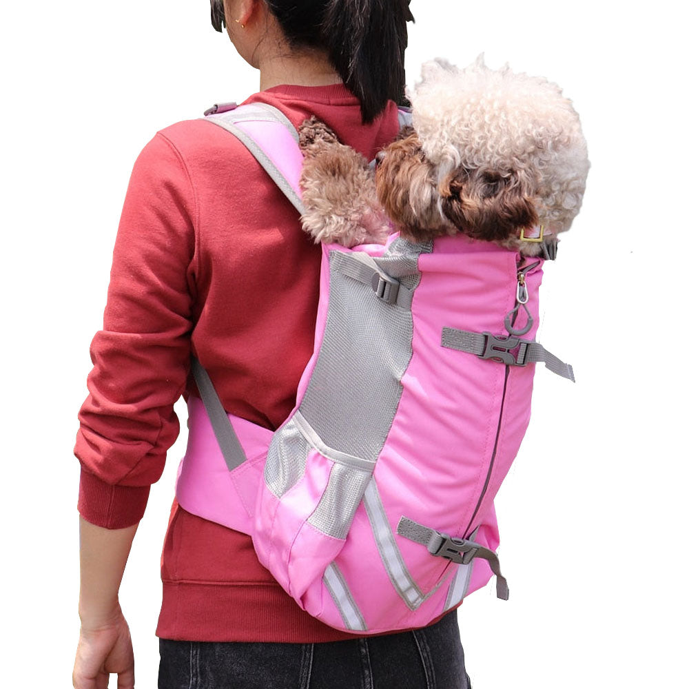 A puddle being carried on the back of a human in a pink Piggyback-Pack Pro™ - Pet Backpack Carrier on a white background.