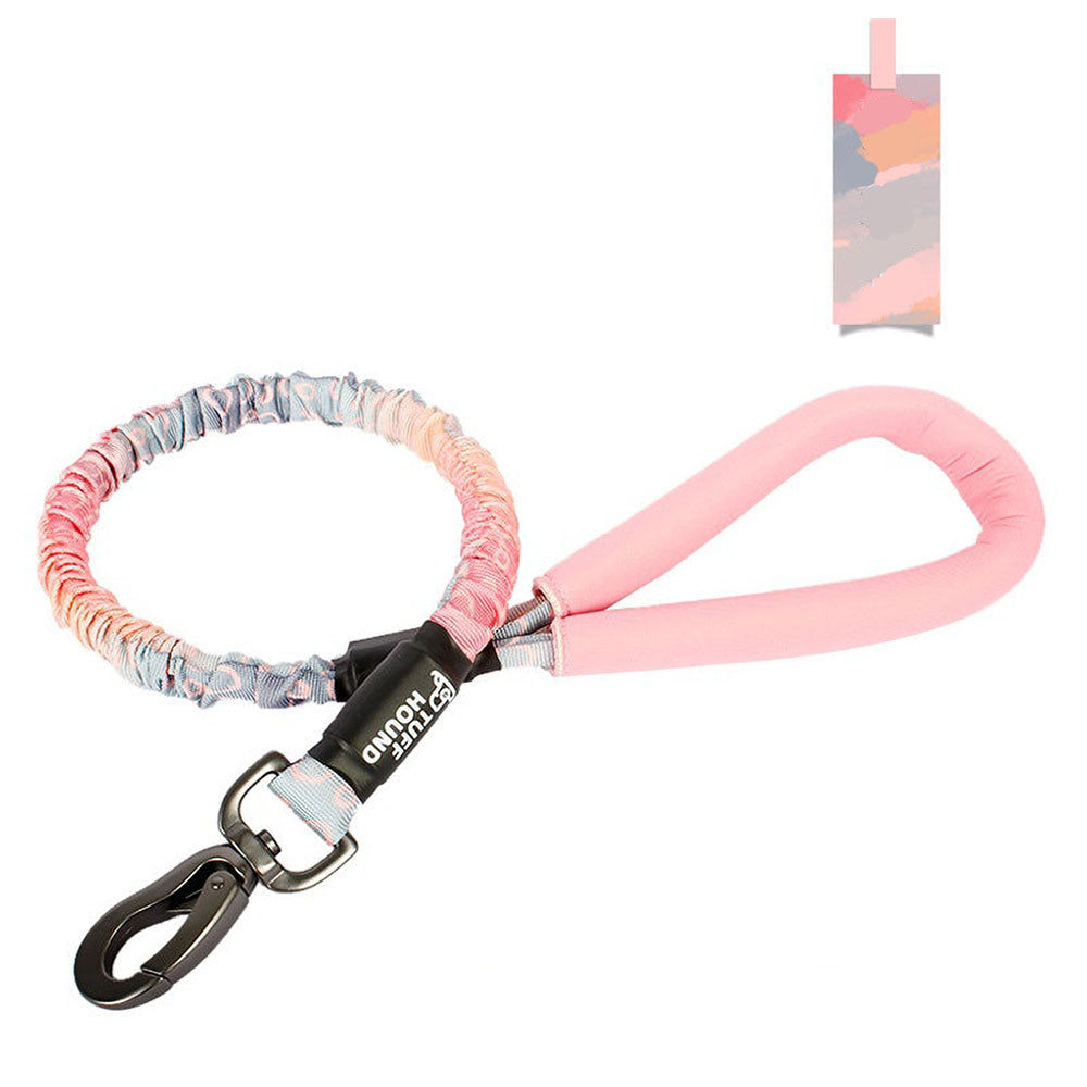 Pink TuffHound Recoil™ - Bungee Dog Leash on a white background. 