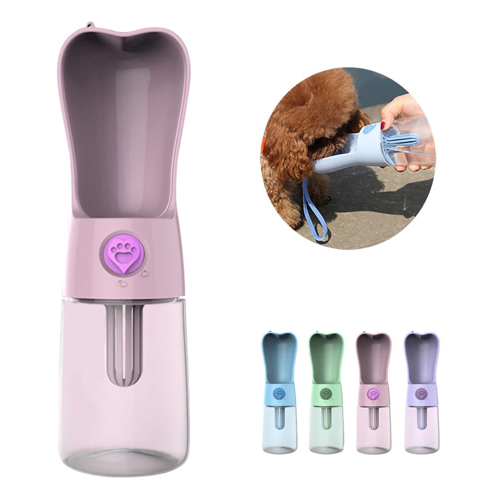 Pink Heart™ - Pet Water Bottle with also a blue, green, pink and purple Heart™ - Pet Water Bottle on a white background and a small brown dog drinking water out of a blue Heart™ - Pet Water Bottle on a vivid background.
