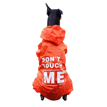 Black dog in an orange Menace™ - Matching Dog & Owner Raincoat, Medium and Large Dogs with hood and legs on a white background. 